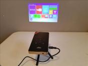 Mini projecteur android+ iptv 1 an